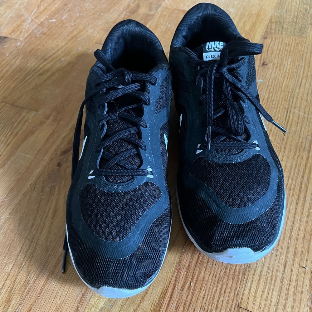 Black Nike training shoes